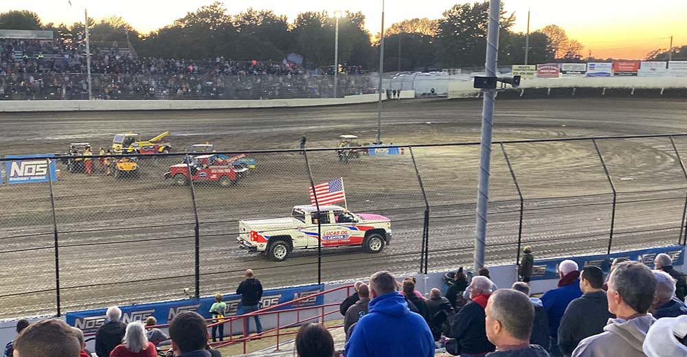 Lucas Oil Center truck circling the track at Tri-State Speedway during National Anthem.